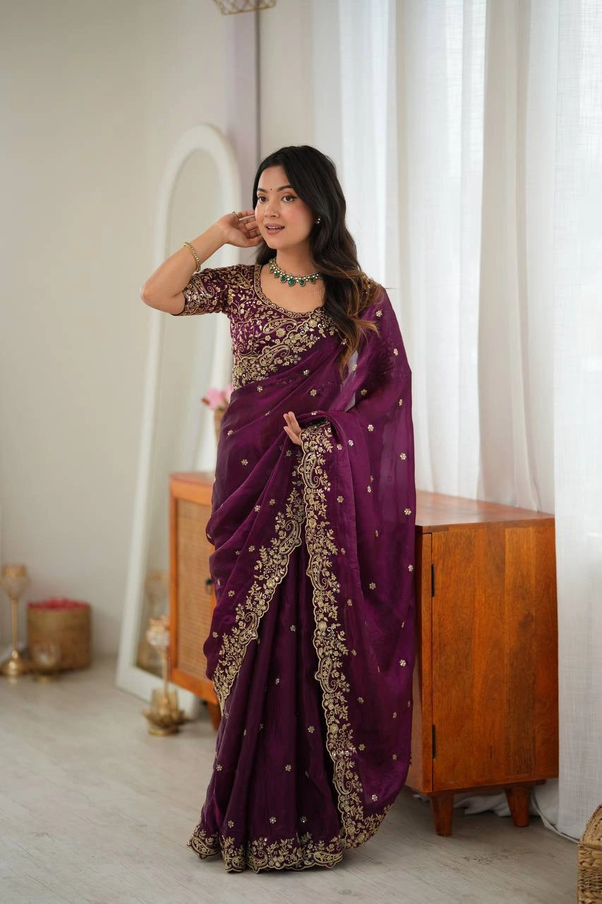 Wine sequins embroidered saree draped on model front pleats